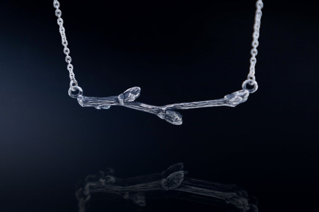 nature inspired minimalist necklace branch