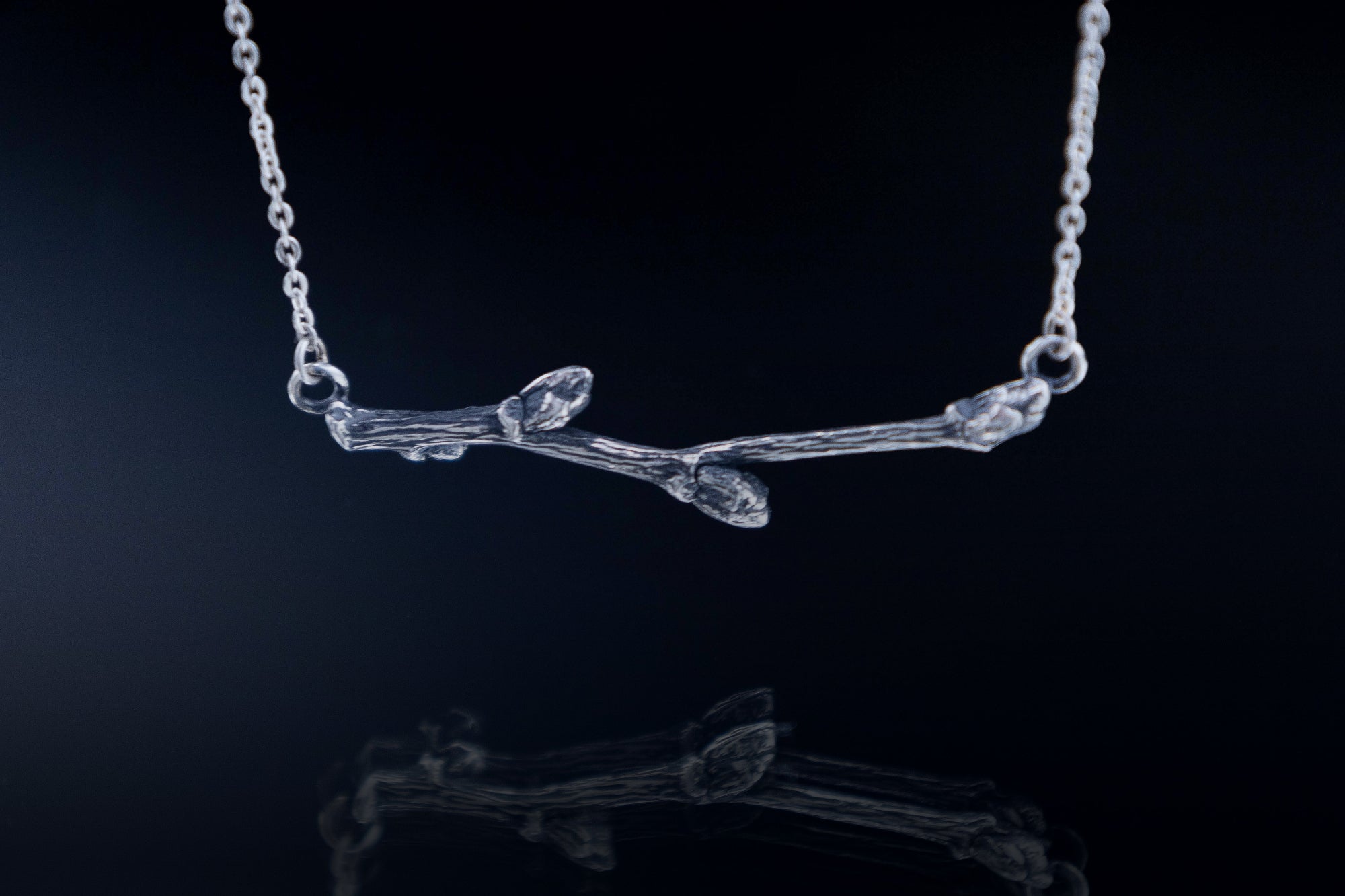 nature inspired minimalist necklace branch