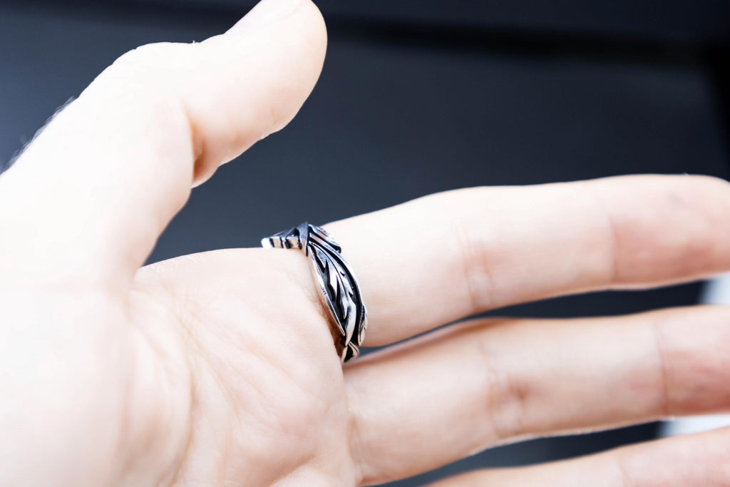 Sterling silver Phoenix ring with garnet on hand