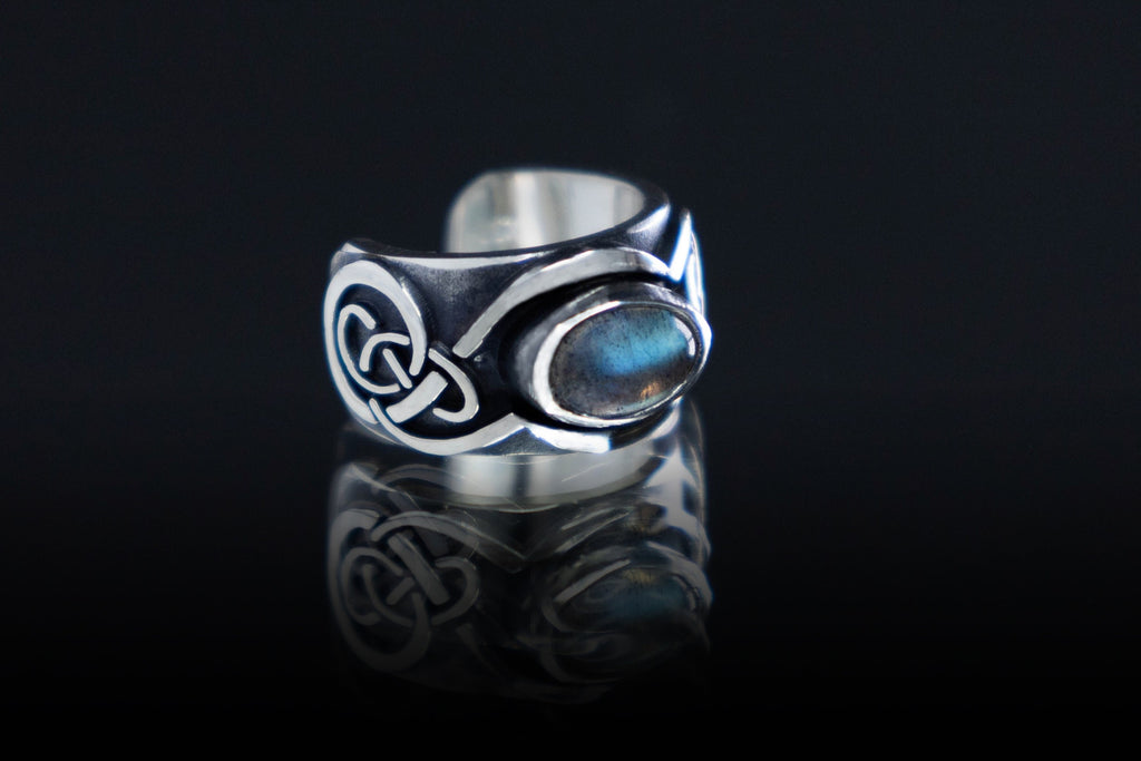 Artisan silver elven ear cuff with labradorite  on dark background