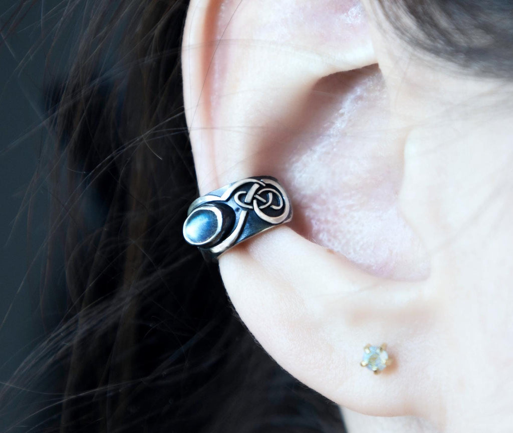 Sterling silver Celtic no-piercing ear cuff worn on ear