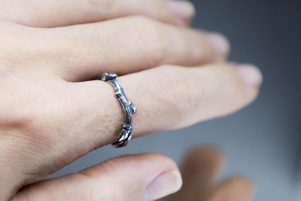 Elven style twig ring worn on hand