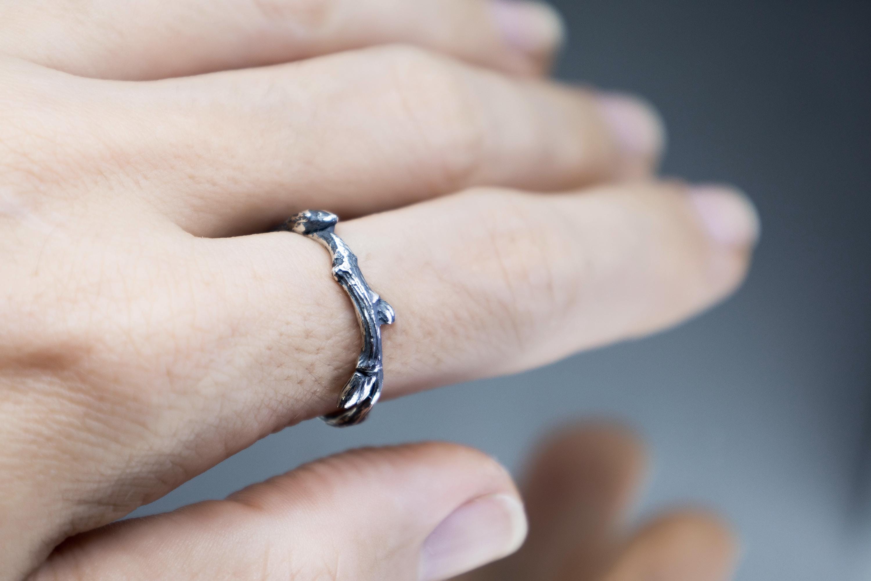 Elven style twig ring worn on hand