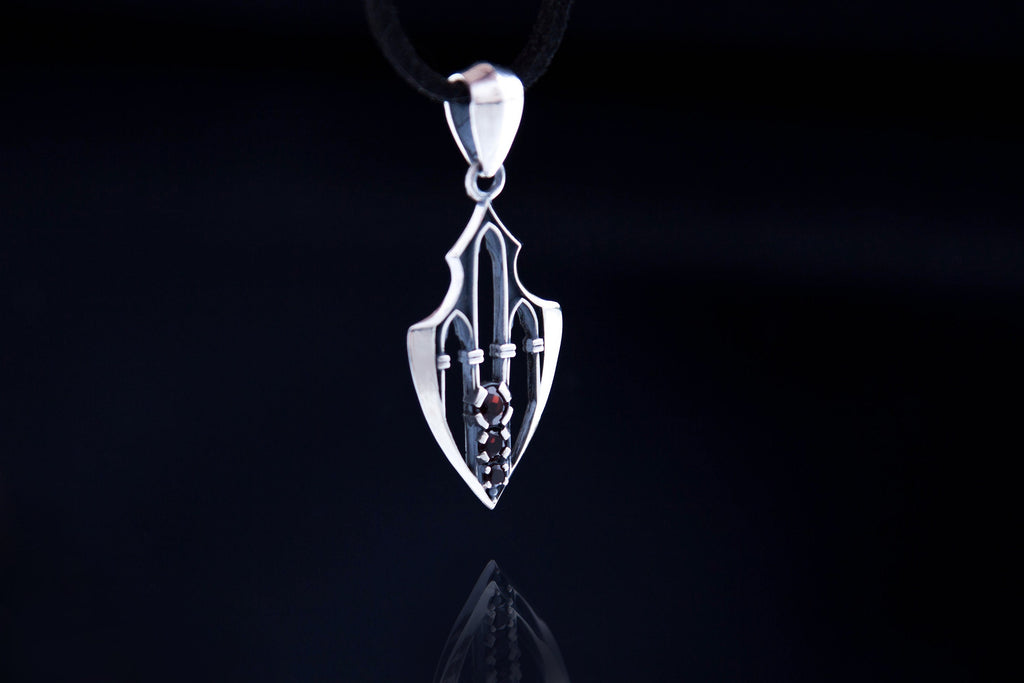 Sterling silver gothic pendant hanging on black cord