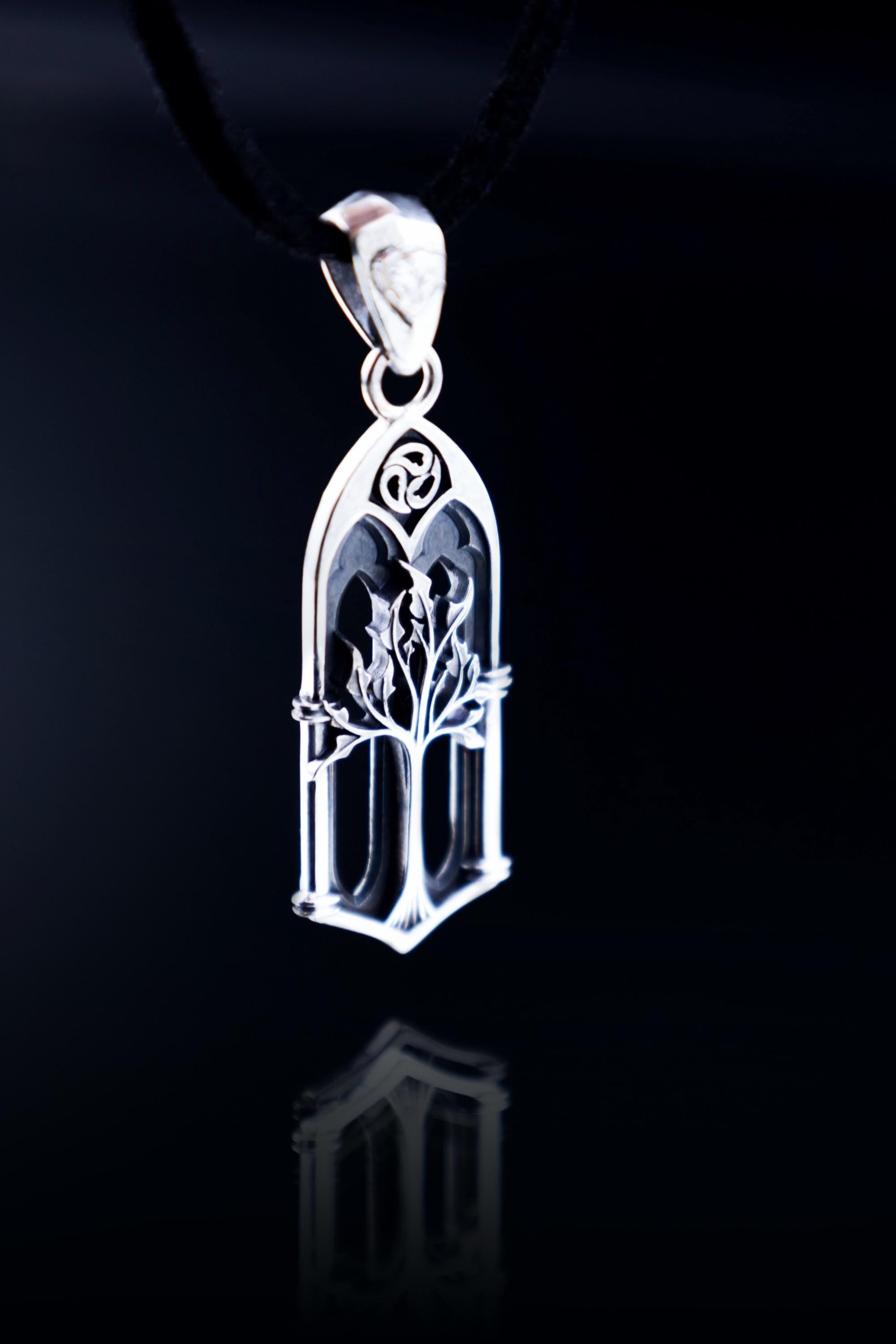 fantasy tree pendant in gothic window frame