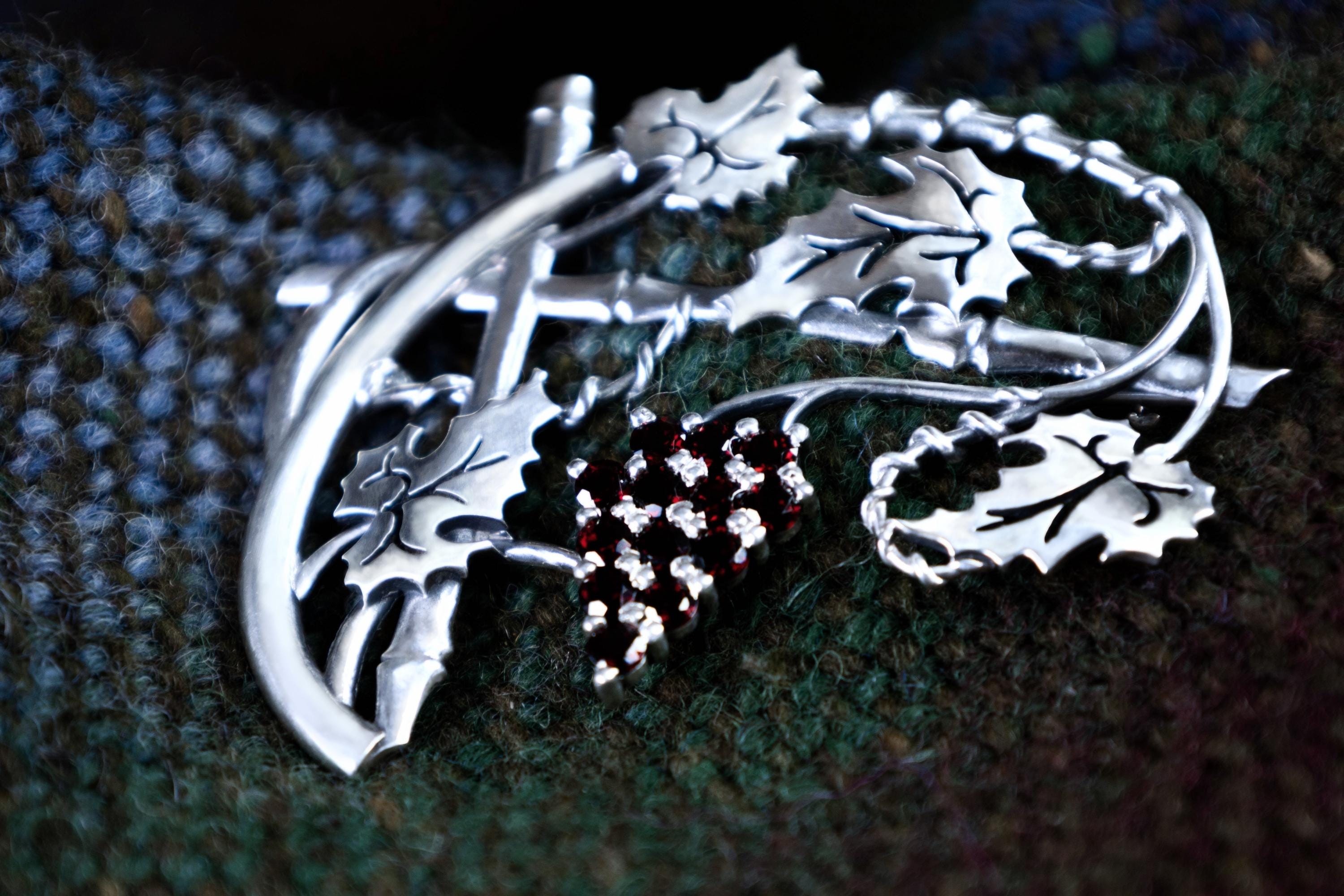 Fantasy woodland style silver brooch with natural garnet berries