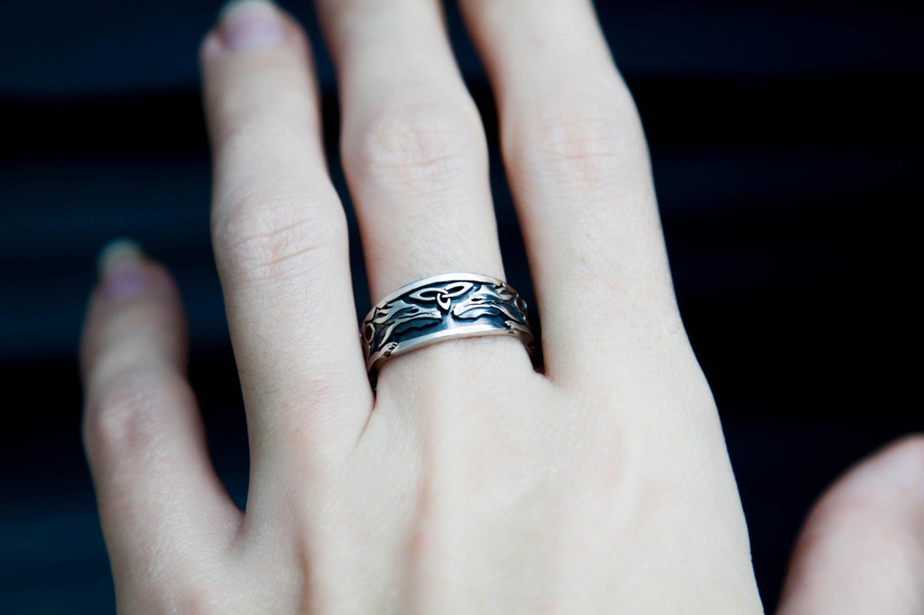 Silver fantasy ring with detailed dragons