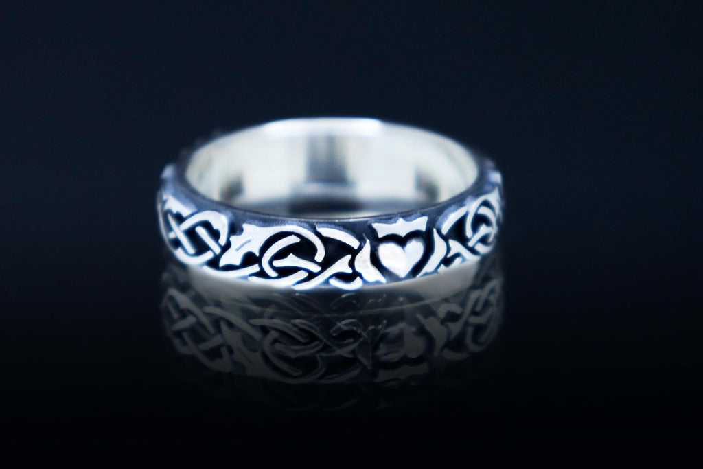 Sterling silver Claddagh ring with holly leaf pattern