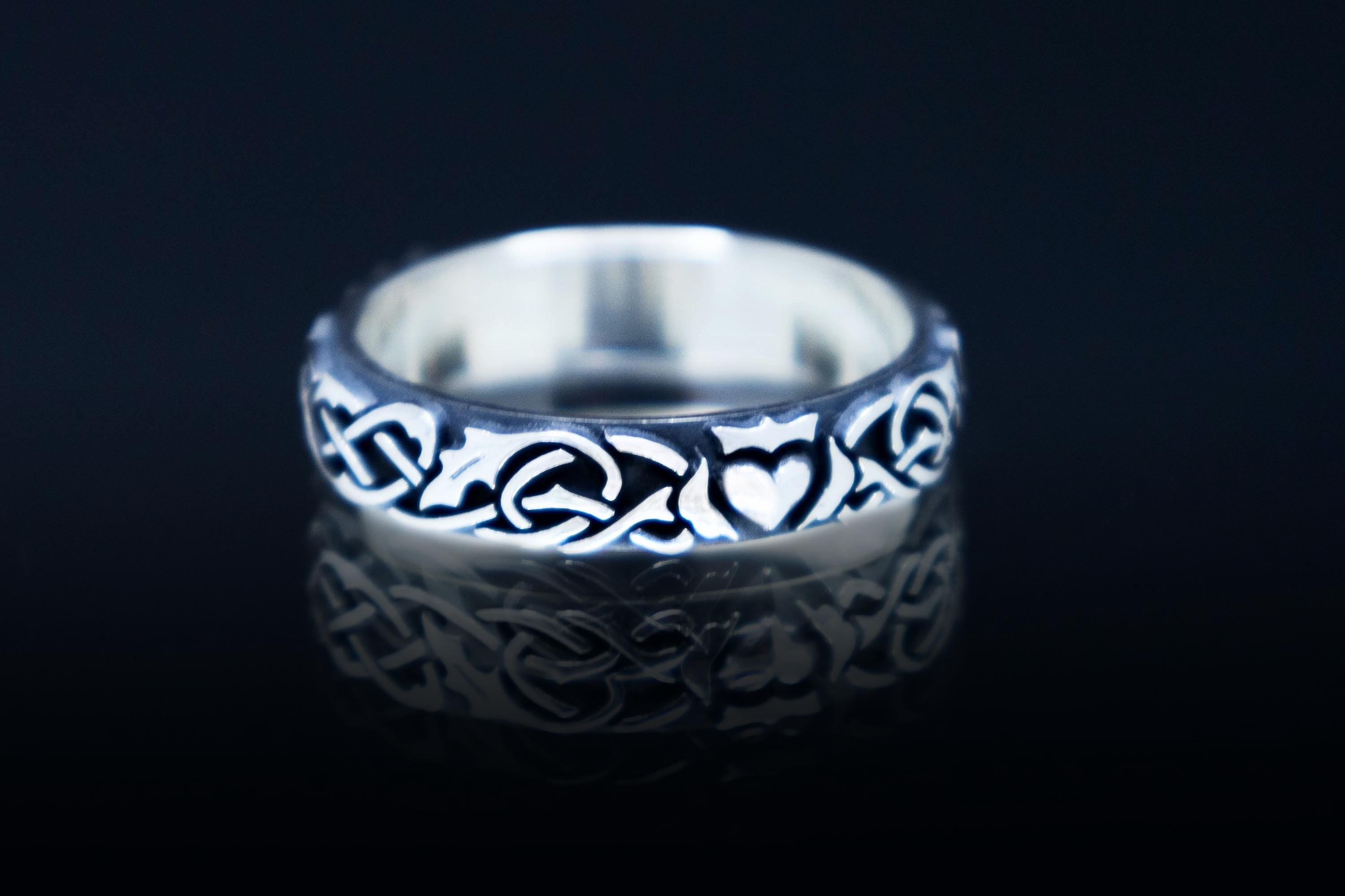 Sterling silver Claddagh ring with holly leaf pattern