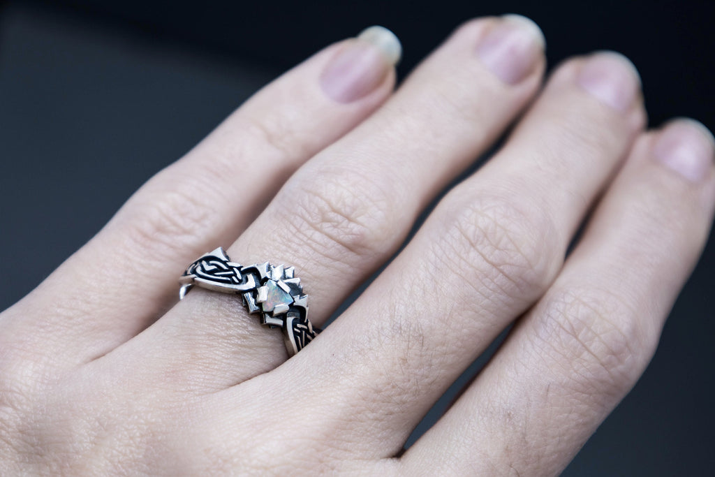 Misty mountain inspired Celtic ring on hand