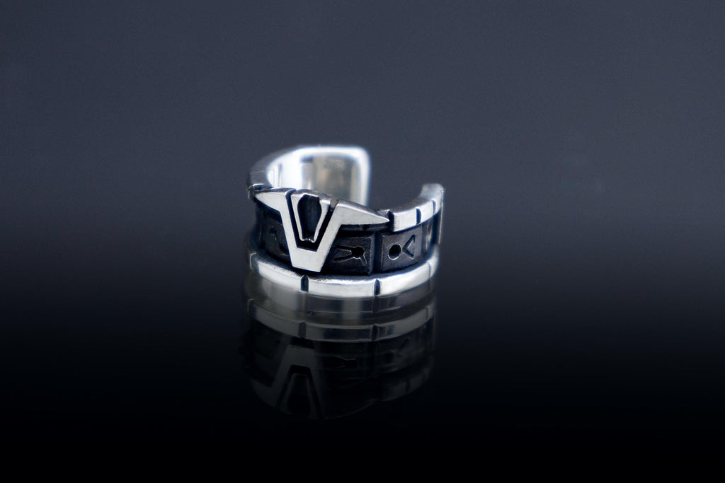 silver ear cuff with Star Gate glyphs
