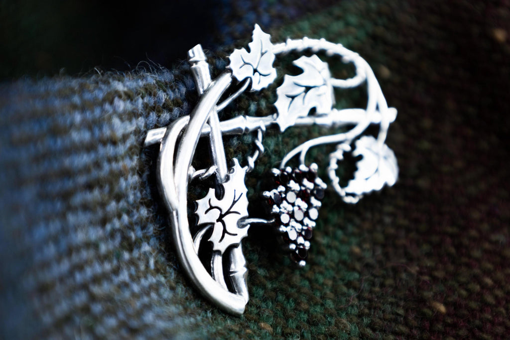 Botanical silver brooch with leaves and garnets, artisan grape jewelry