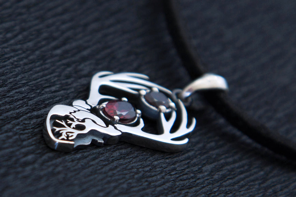 Silver Hannigram-inspired stag pendant with natural garnets, dark romantic charm