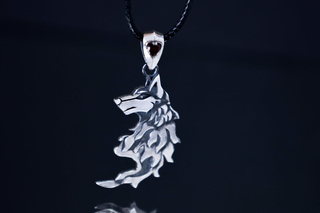 Wolf silver pendant with garnet