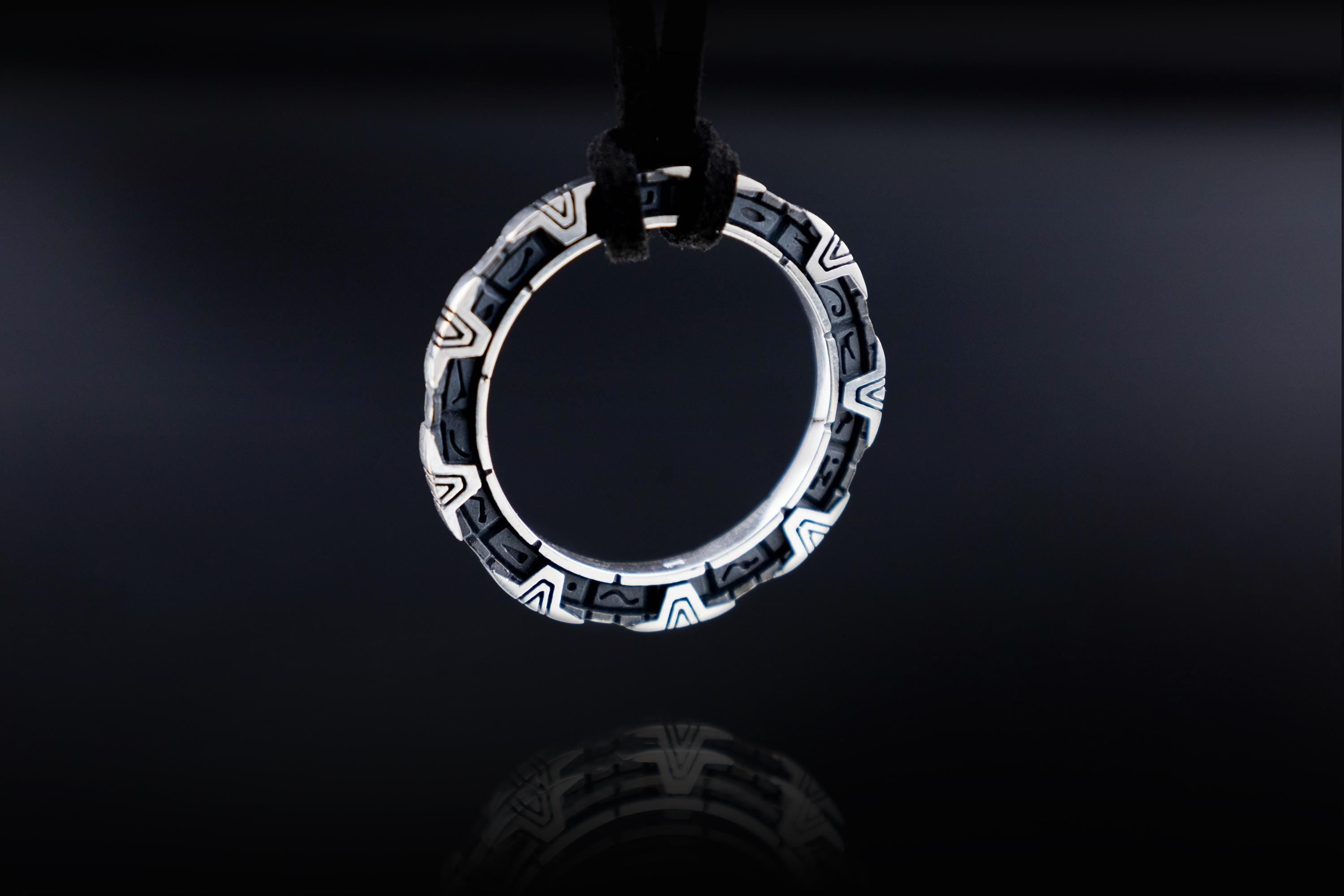 StarGate Double-sided sterling silver portal pendant with glyph symbols