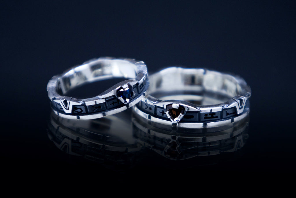 Stargate ring with garnet or blue c.z