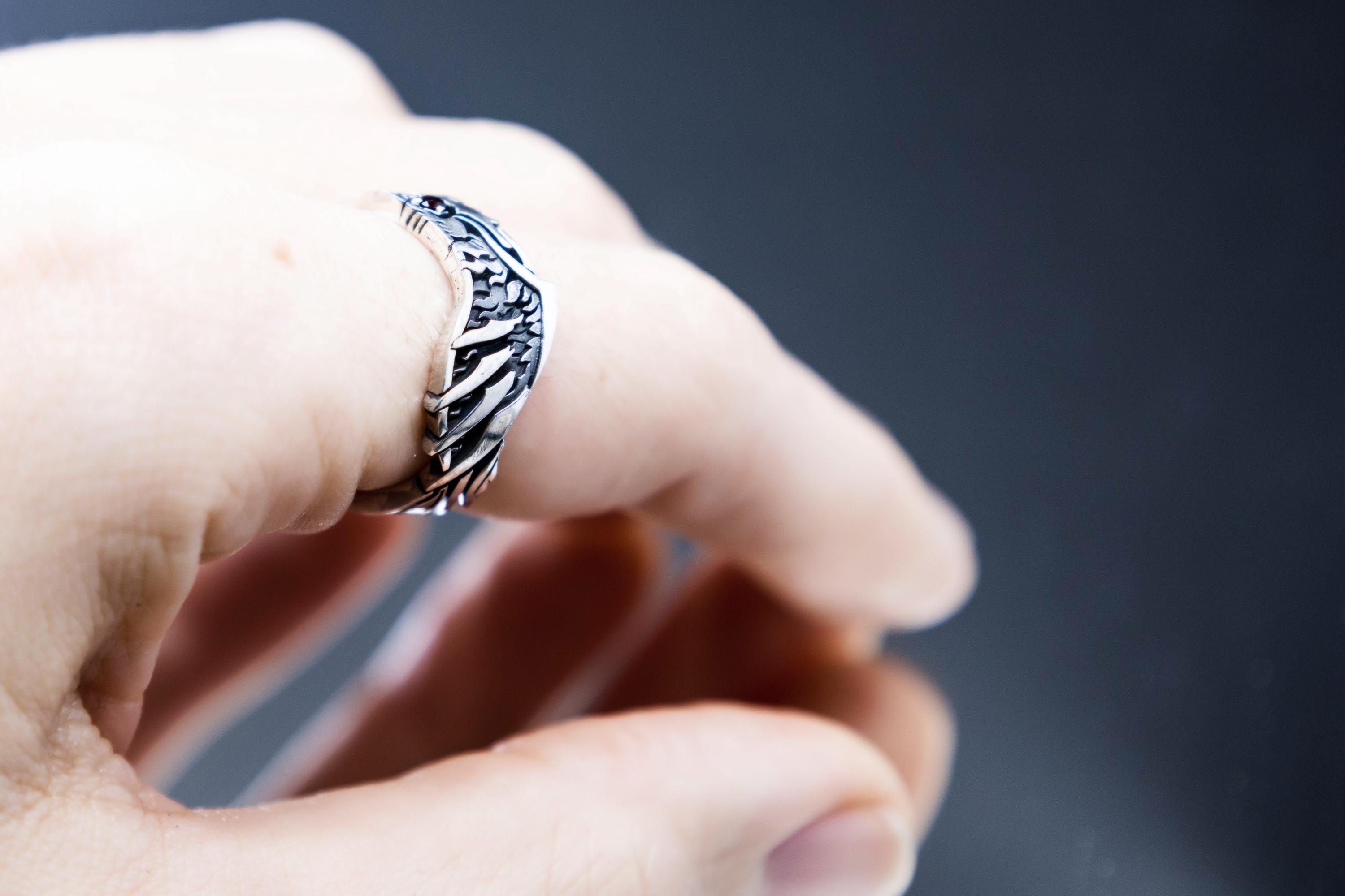 Sterling silver Phoenix ring with garnet on hand