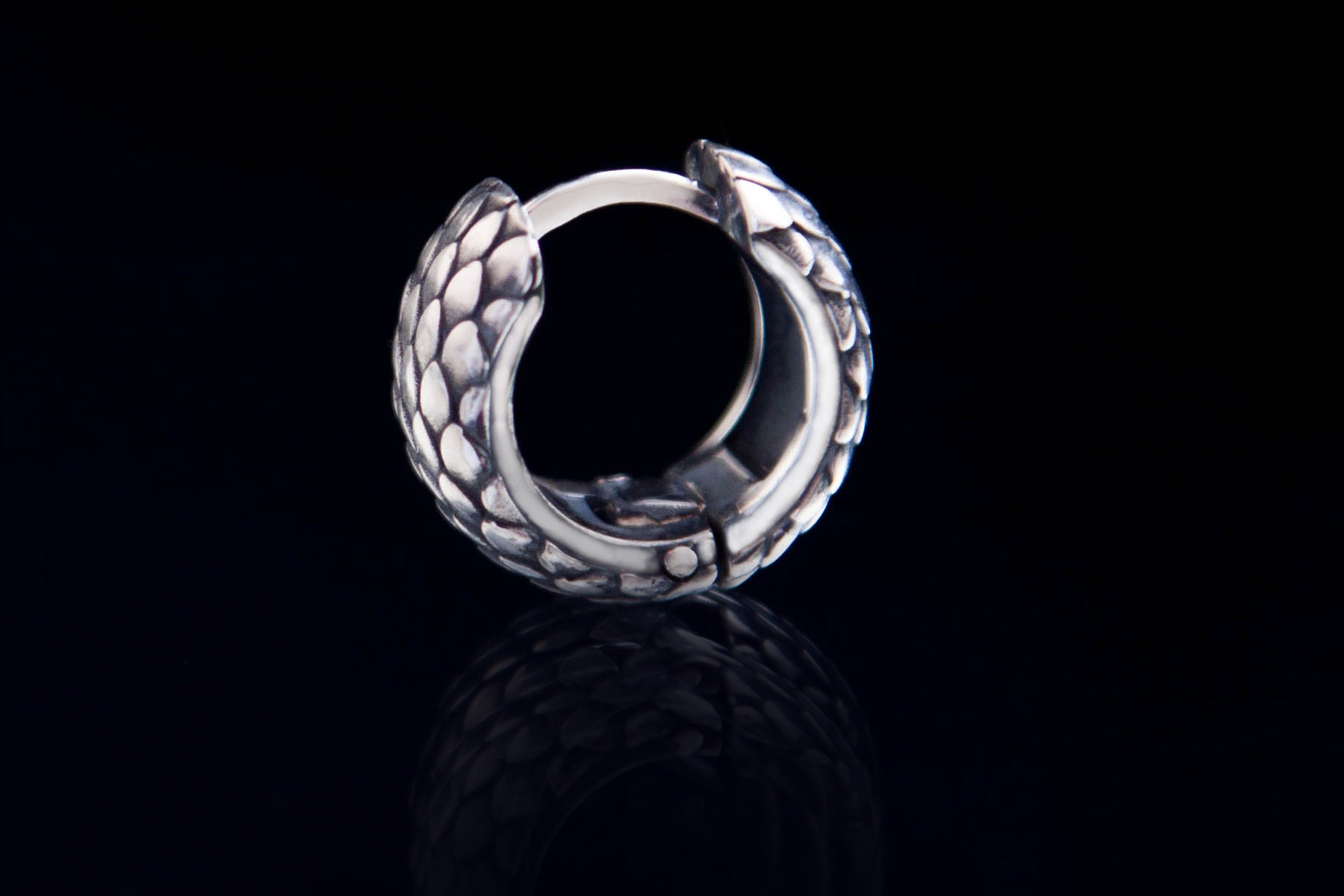 Textured fantasy-style silver hoop