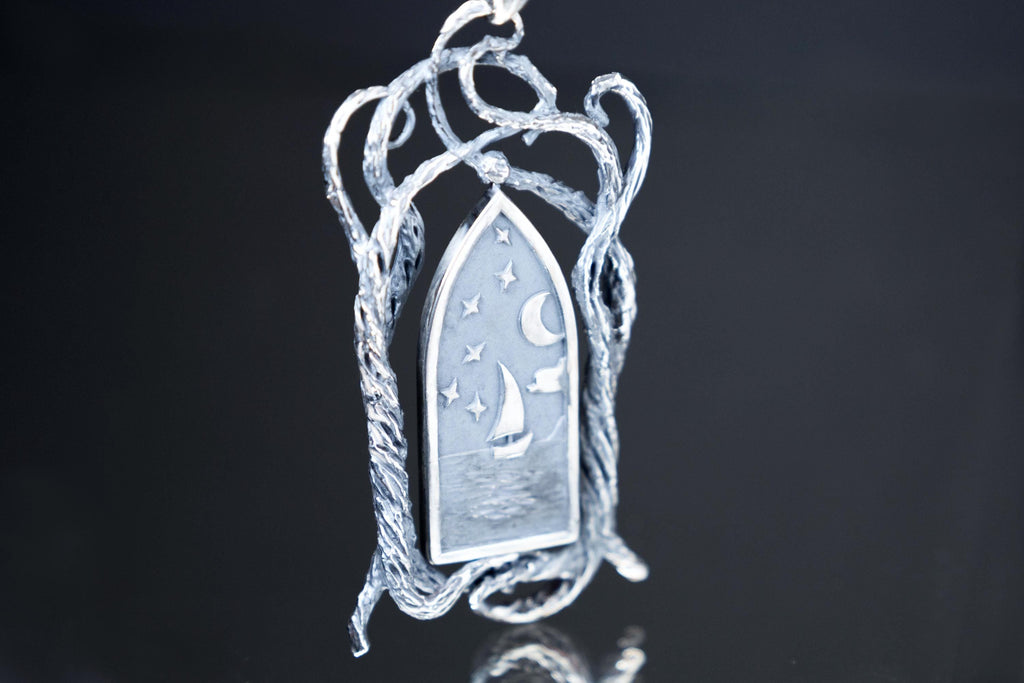 Handcrafted spinning Elvish talisman pendant, fantasy jewelry