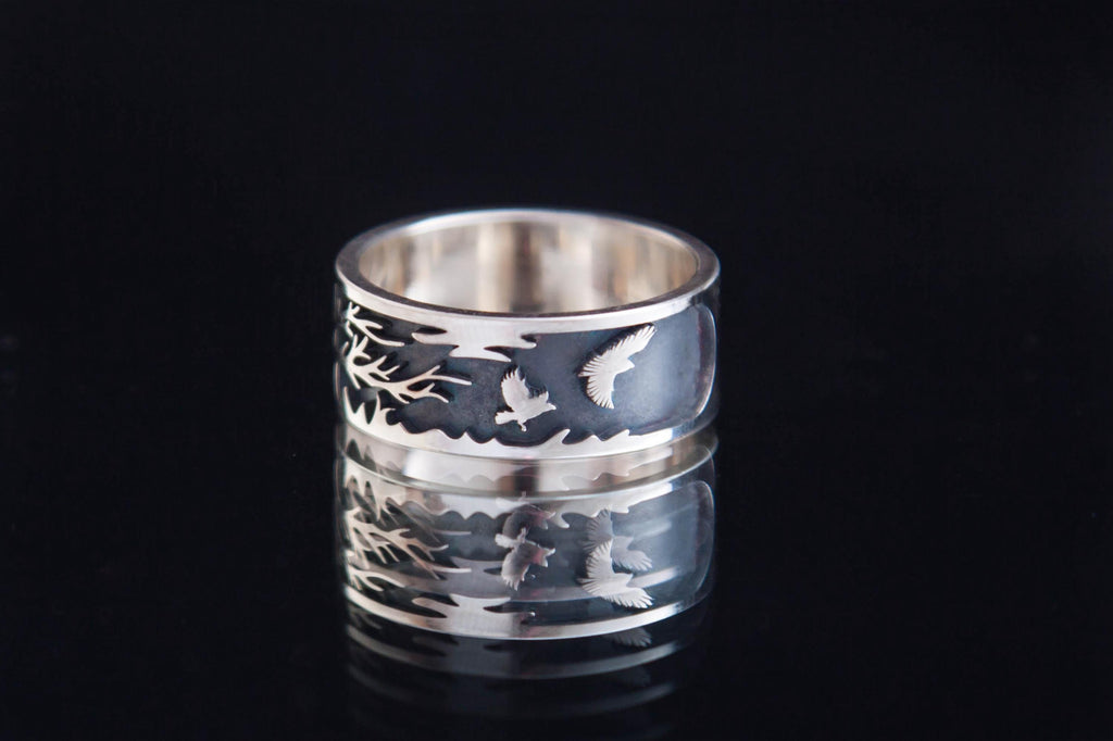 Minimalist silver band with engraved steppe and flying birds