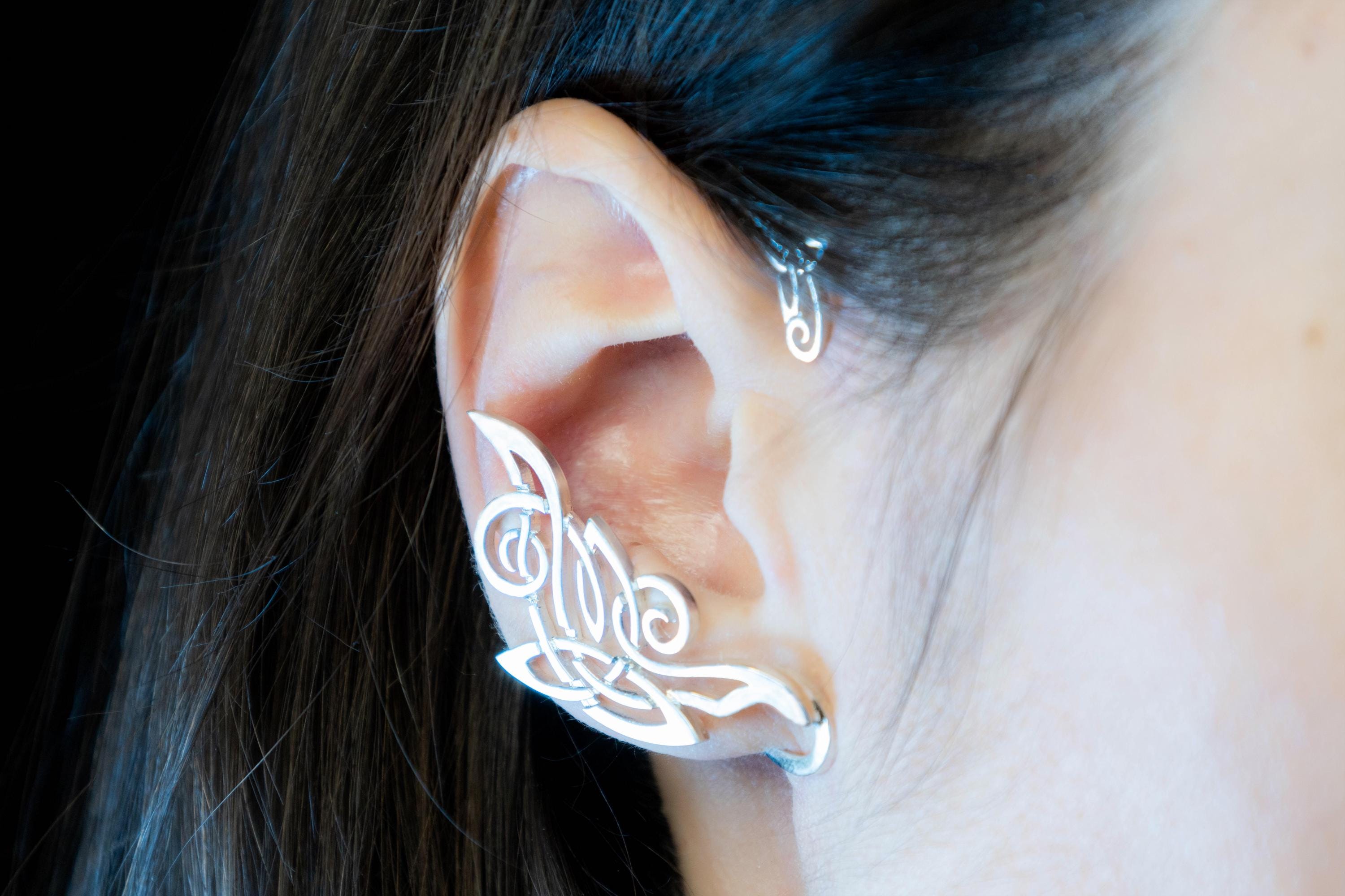 Large sterling silver Celtic ear cuff worn on ear